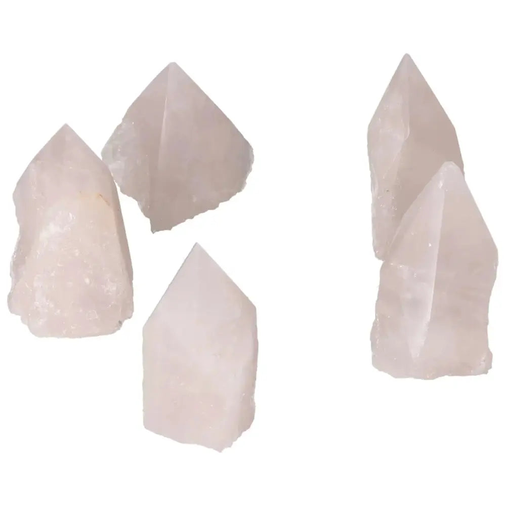 Set of Polished Point Rose Quartz Crystals from Sylvia Crystals, showcasing refined craftsmanship and gentle pink hues.