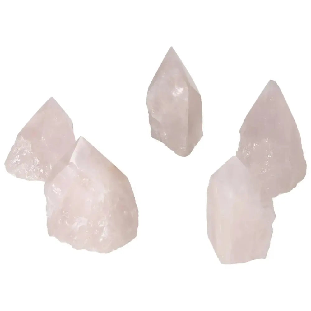 Polished Point Rose Quartz S crystals showcasing elegant craftsmanship by Sylvia Crystals, embodying luxury and natural beauty.