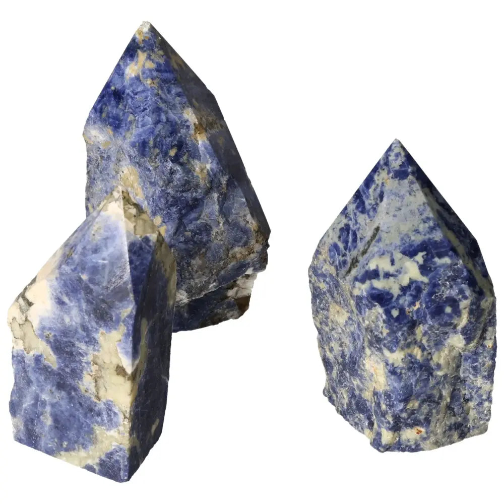 Polished Point Sodalite L gemstones showcasing blue hues, enhancing creativity and clarity, by Sylvia Crystals.