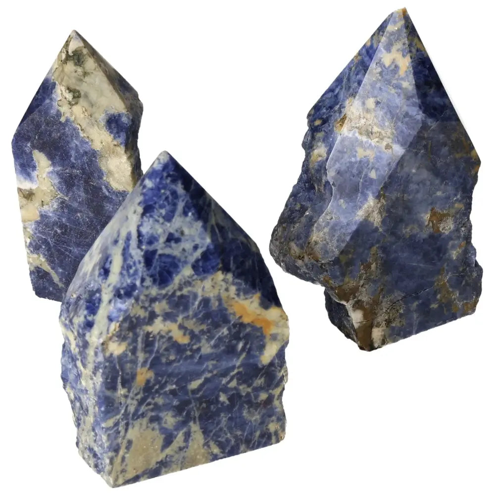 Three polished sodalite crystal points showcasing vibrant blue hues and intricate patterns, ideal for spiritual and creative enhancement.