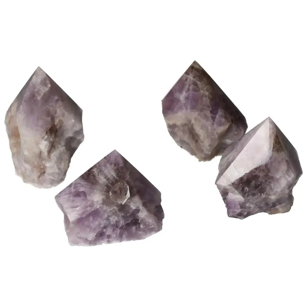 Polished Point Super Seven Amethyst L crystals from Sylvia Crystals, showcasing deep purple hues and intricate patterns.