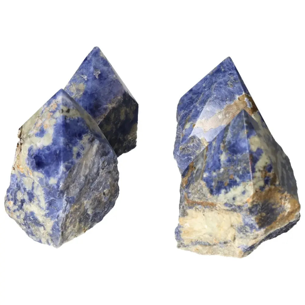 Two polished sodalite crystal points from Sylvia Crystals, designed to enhance creativity and clear thinking.