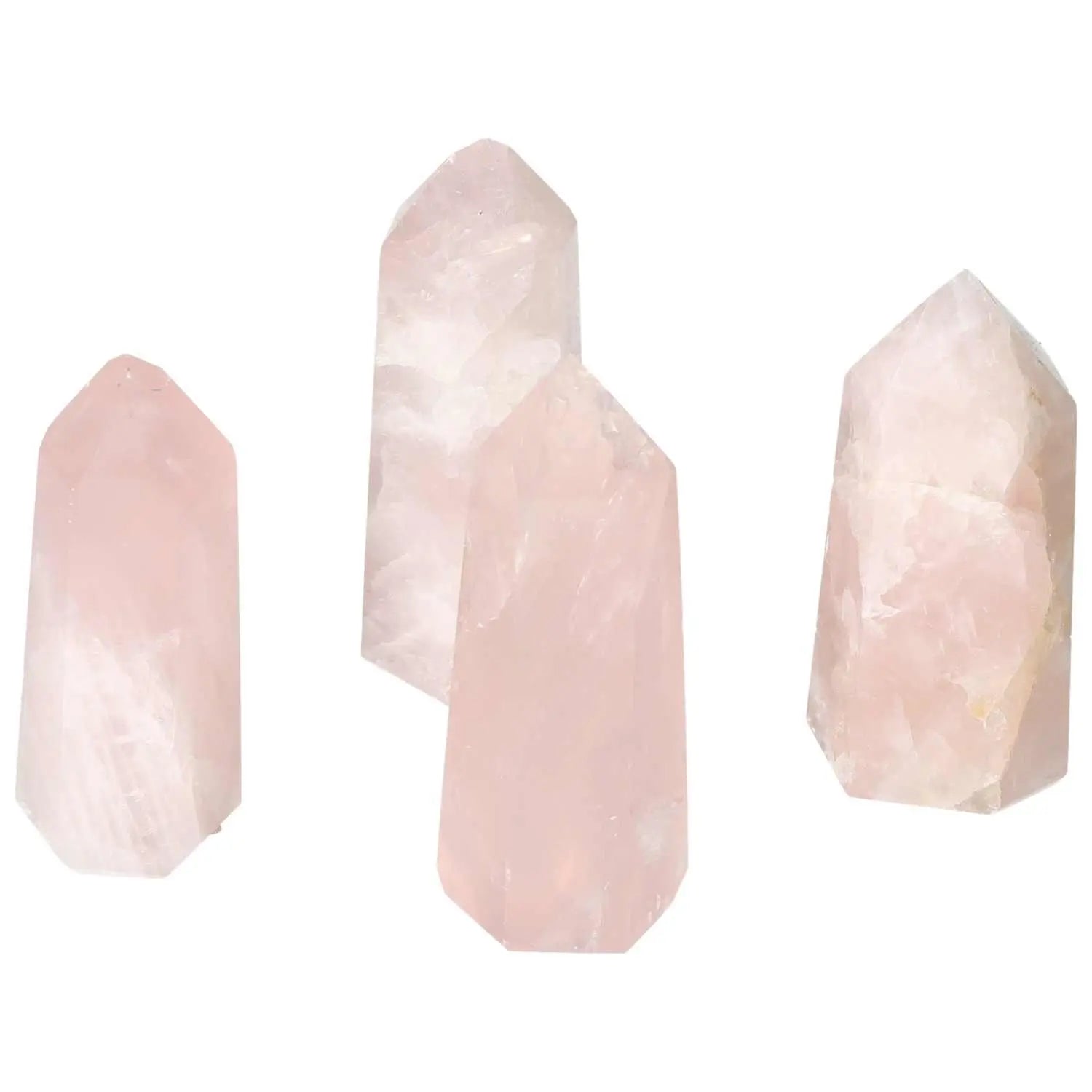 Four polished pink quartz obelisks radiating gentle energy, perfect for spiritual collections.