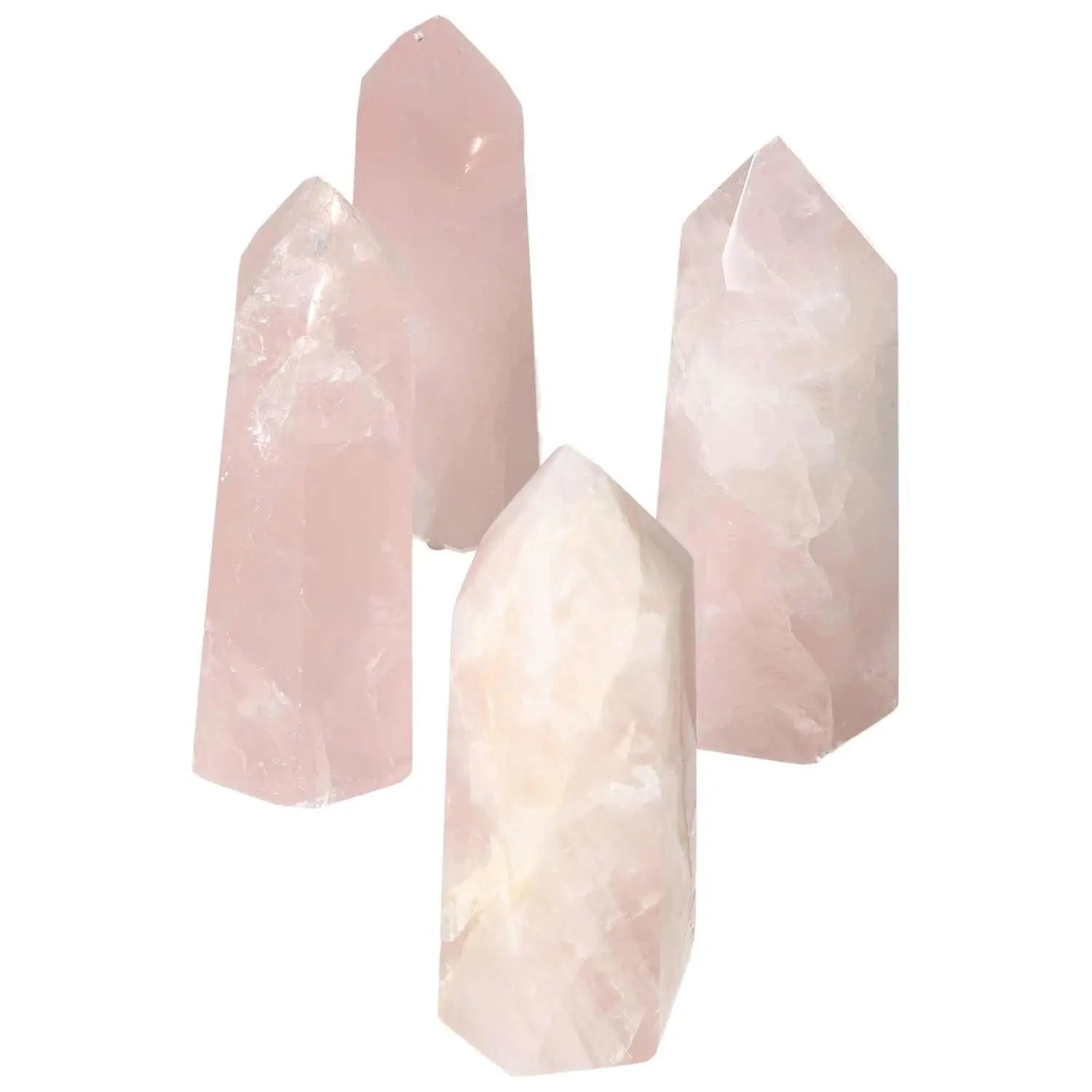 Polished rose quartz obelisk collection featuring soft pink hues, known for gentle energy and heart chakra connection, by Sylvia Crystals.