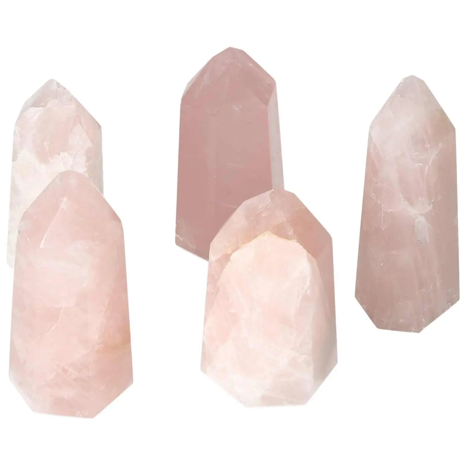 Collection of Polished Rose Quartz Obelisks featuring gentle pink hues, radiating love and tranquility, from Sylvia Crystals.