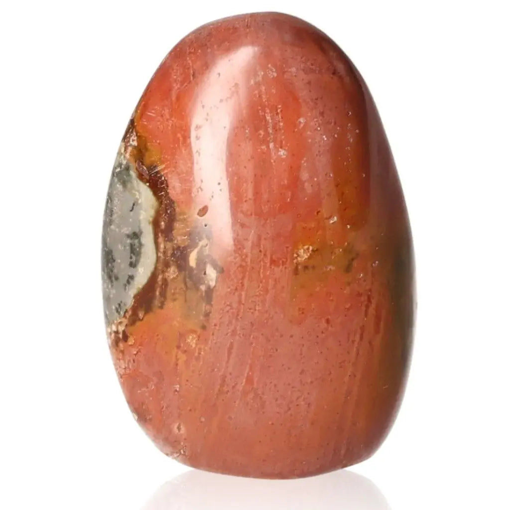 Polychrome Jasper Free Form stone displaying vibrant red and earthy hues, perfect for home decor and spiritual energy.