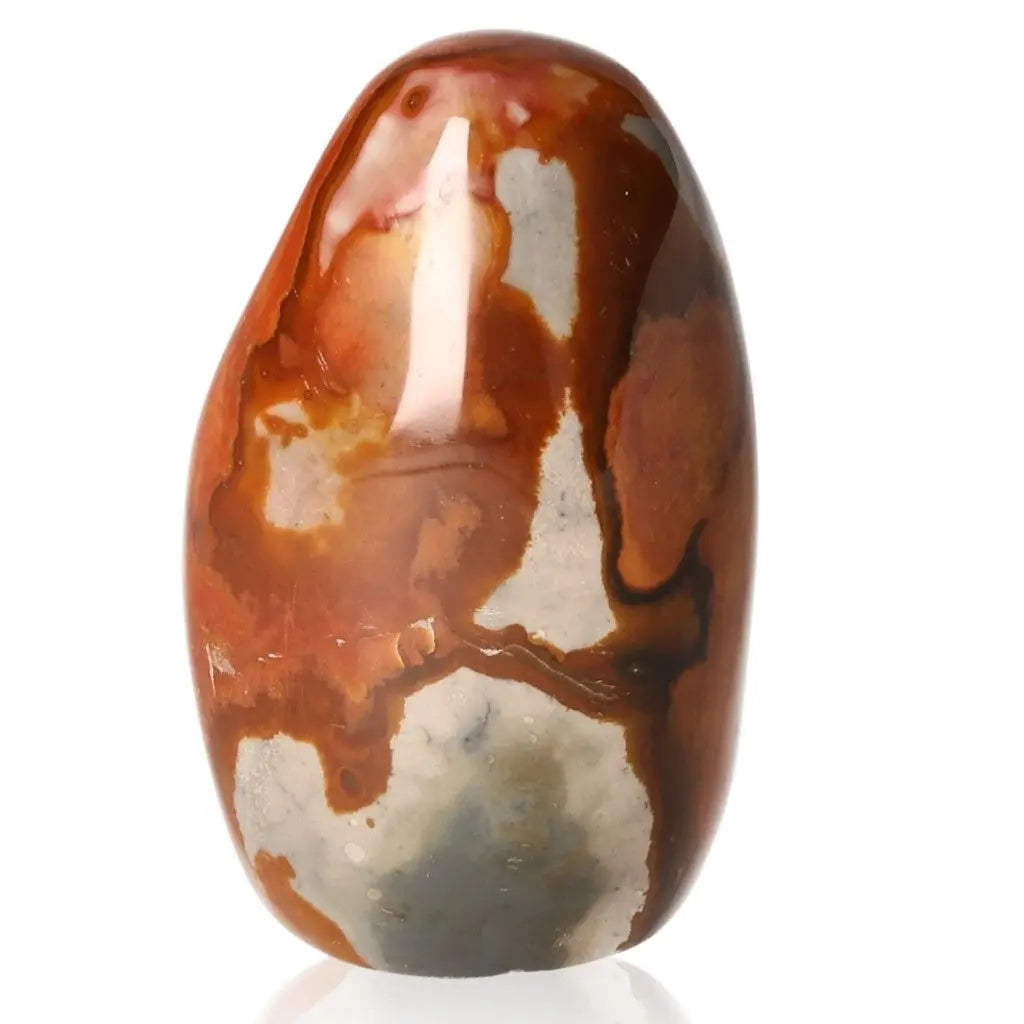 Polychrome Jasper Free Form stone showcasing vibrant red, orange, and brown hues, also known as Desert Jasper, on white background.