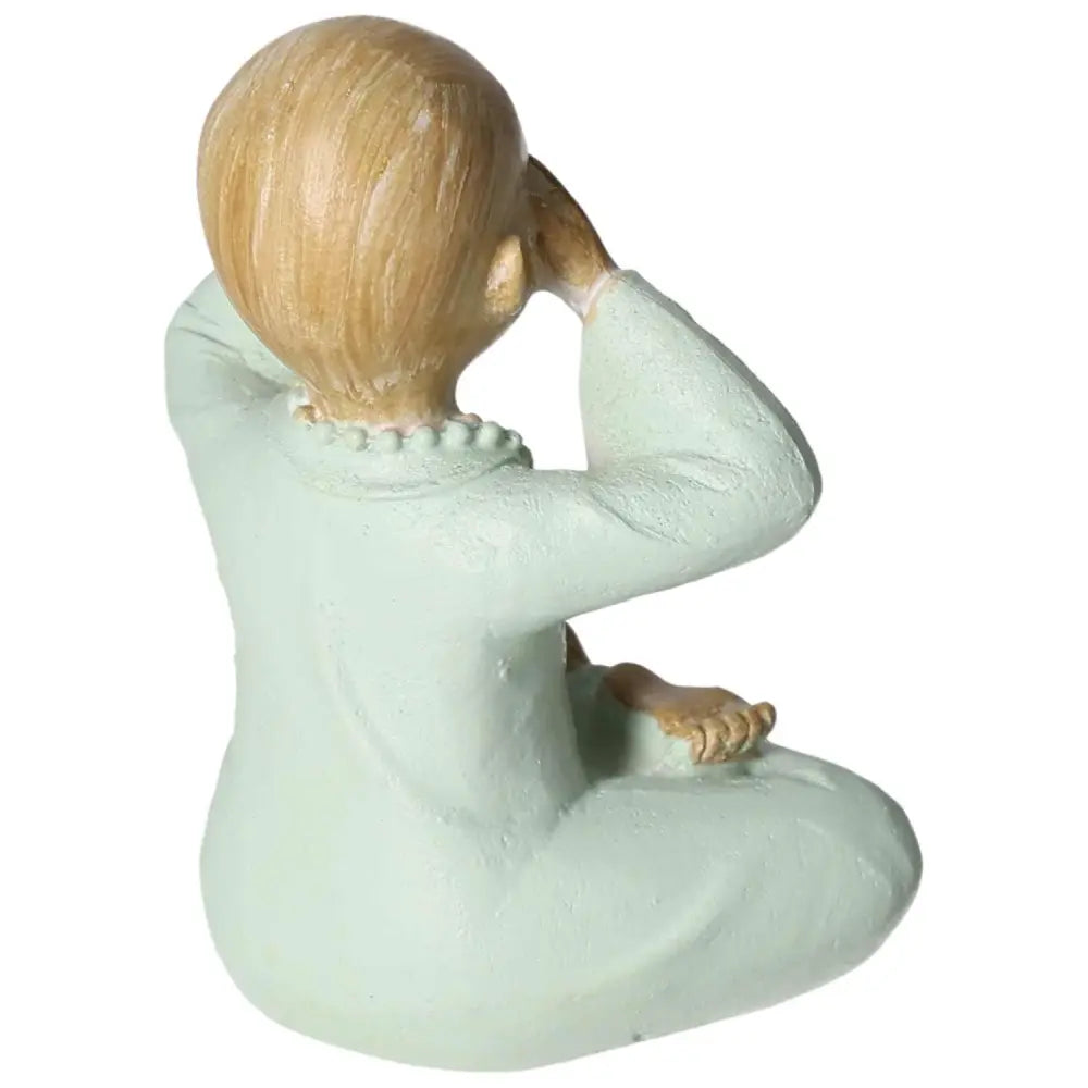 Polyresin monk figurine in a meditative pose, from Sylvia Crystals. Elegant craftsmanship for serene home decor.