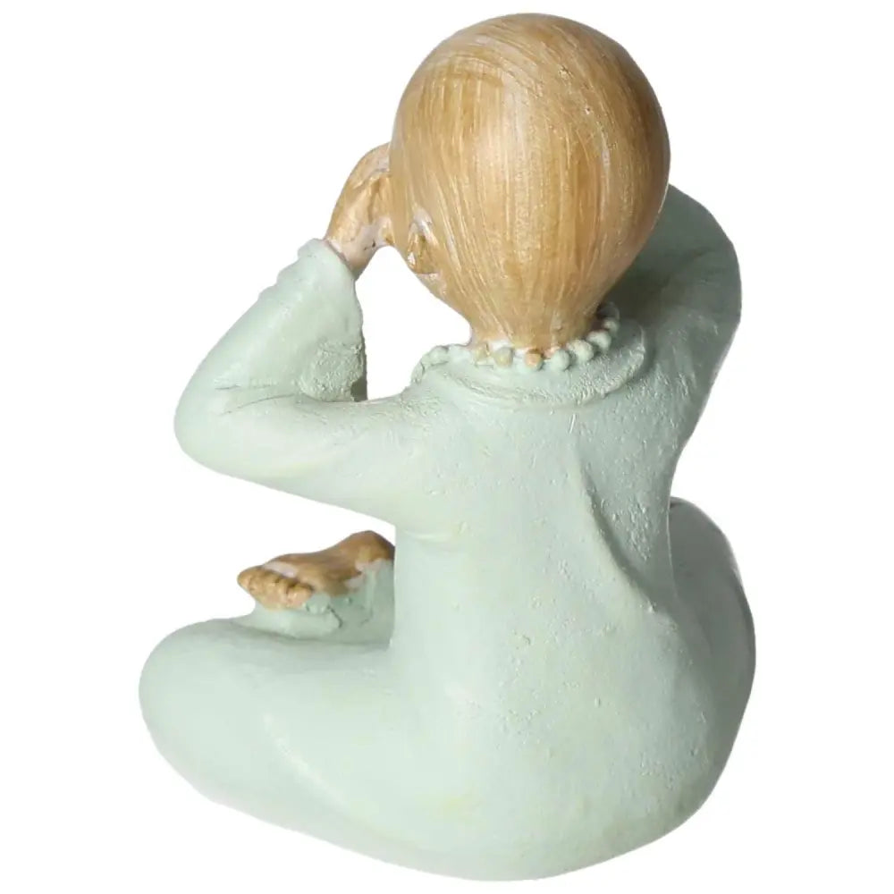 Back view of Monk Made Of Poly 2 figure, showcasing intricate design, representing tranquility from Sylvia Crystals' premium collection.