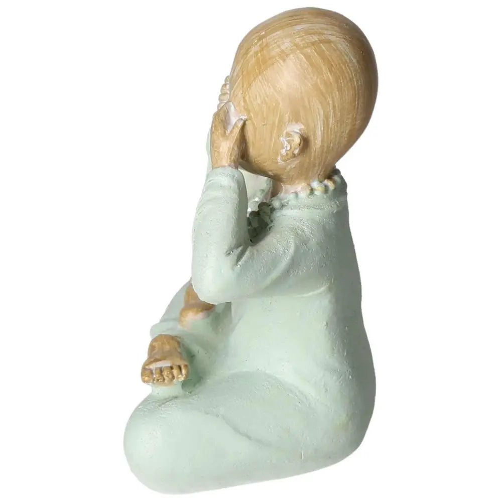 Elegant handmade polyresin monk figurine from Sylvia Crystals, symbolizing spirituality and luxury, in a meditative pose.