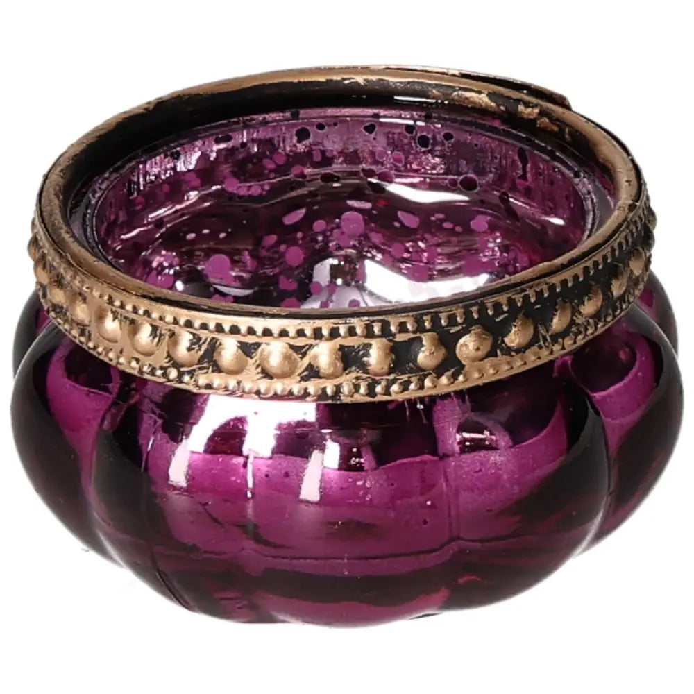 Luxurious purple candle holder from Sylvia Crystals with intricate gold detailing, symbolizing tranquility and elegance.