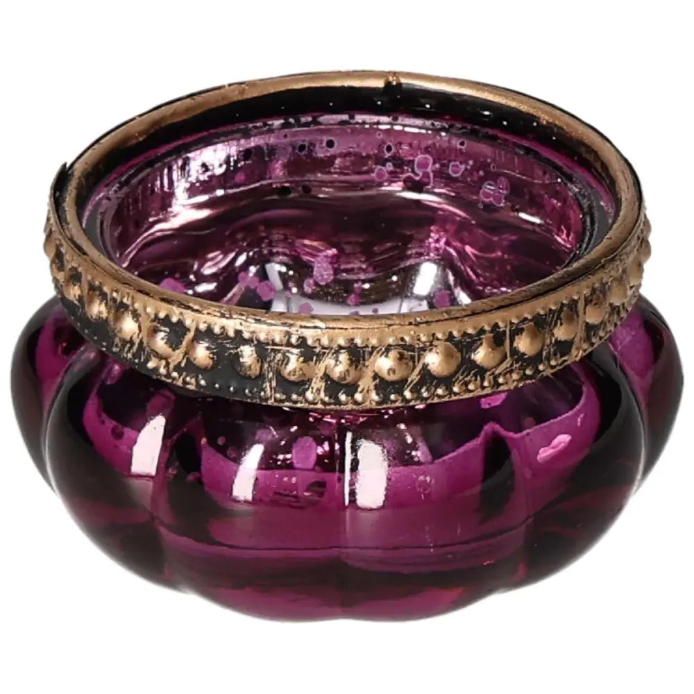 Elegant purple candle holder with intricate design, from Sylvia Crystals, symbolizing luxury and spirituality.