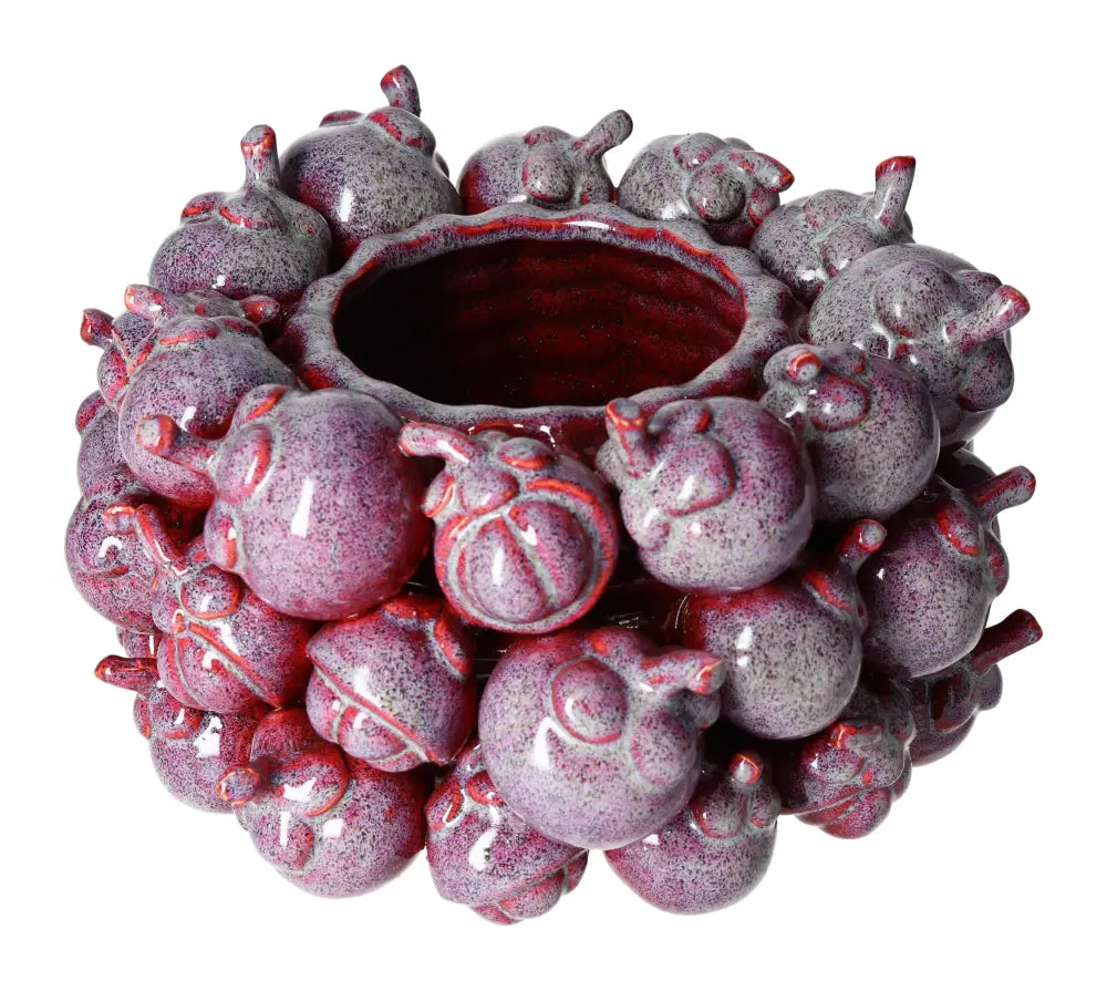 Handcrafted purple earthware flower pot featuring intricate berry-like details and a glossy finish, ideal for elegant home decor.