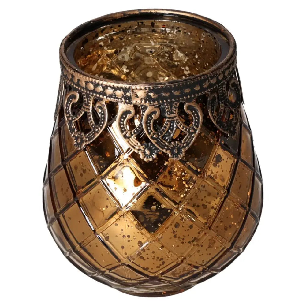 Ornate amber glass lantern with intricate metal rim design, perfect for adding a touch of elegance and warmth to any home decor.