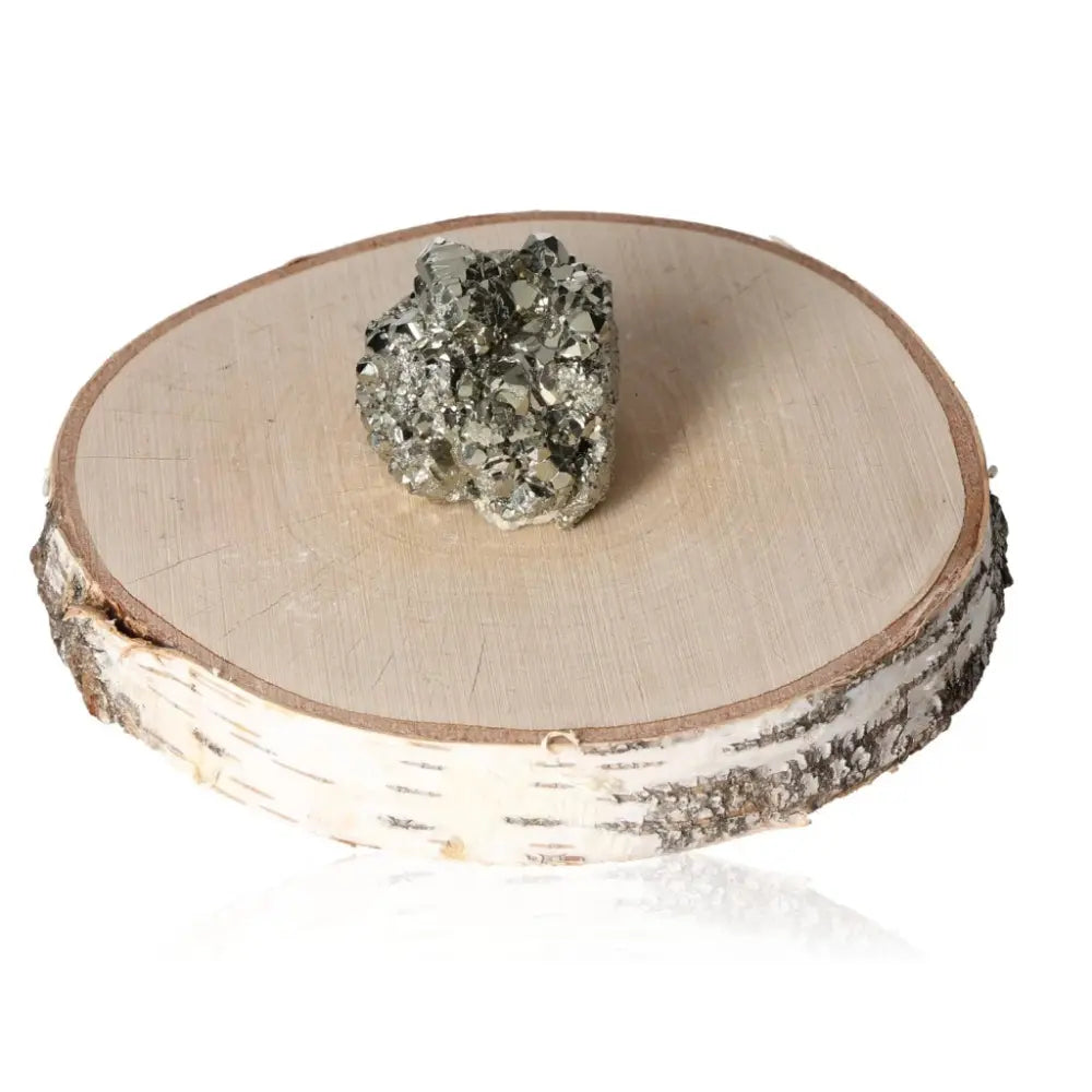 Pyrite druzy on a wooden base, showcasing its radiant golden hue and metallic luster. Ideal for enhancing abundance and prosperity.