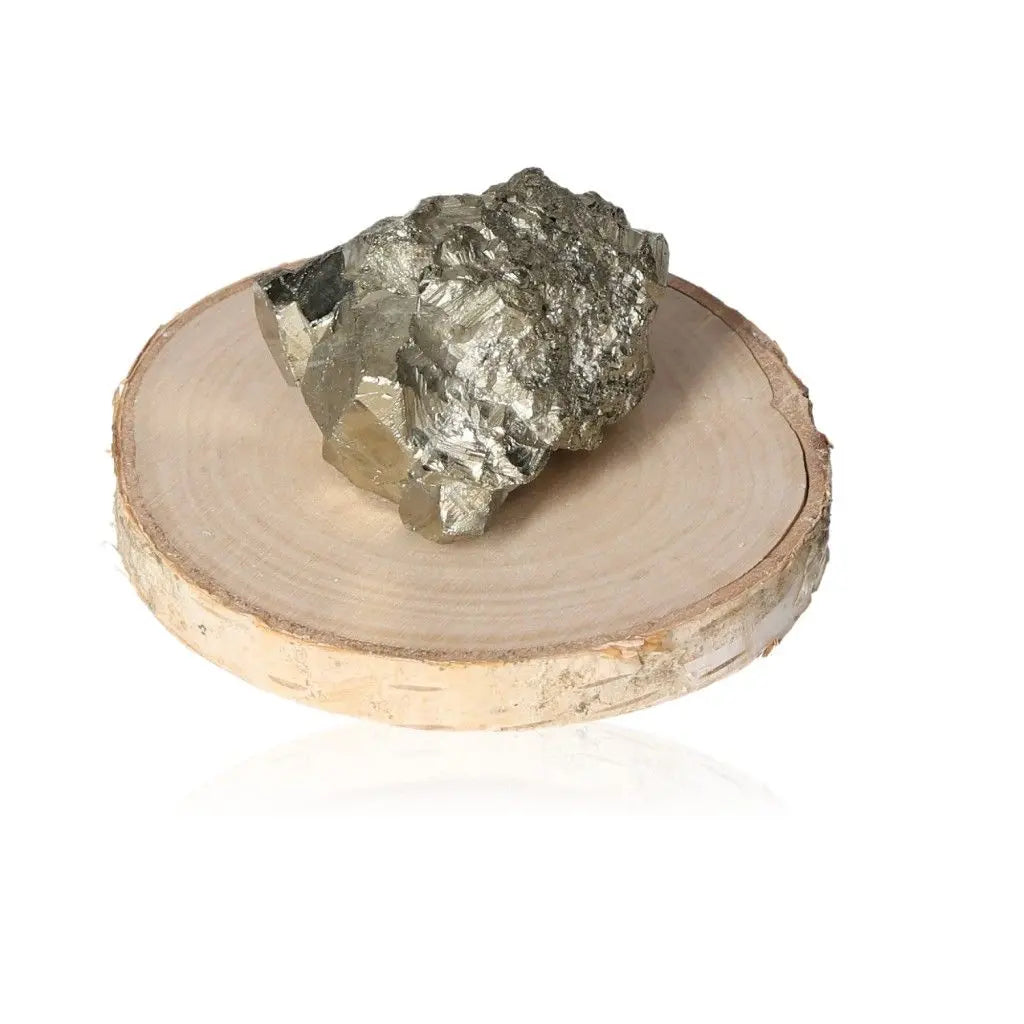 Pyrite druze crystal with golden hue on wooden display, symbolizing prosperity and abundance.