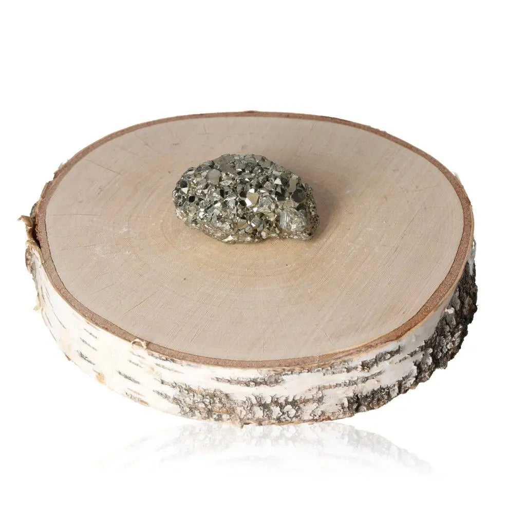 Pyrite druze on wooden base showcasing golden hue and metallic luster, symbolizing wealth and success, known as Fool's Gold.