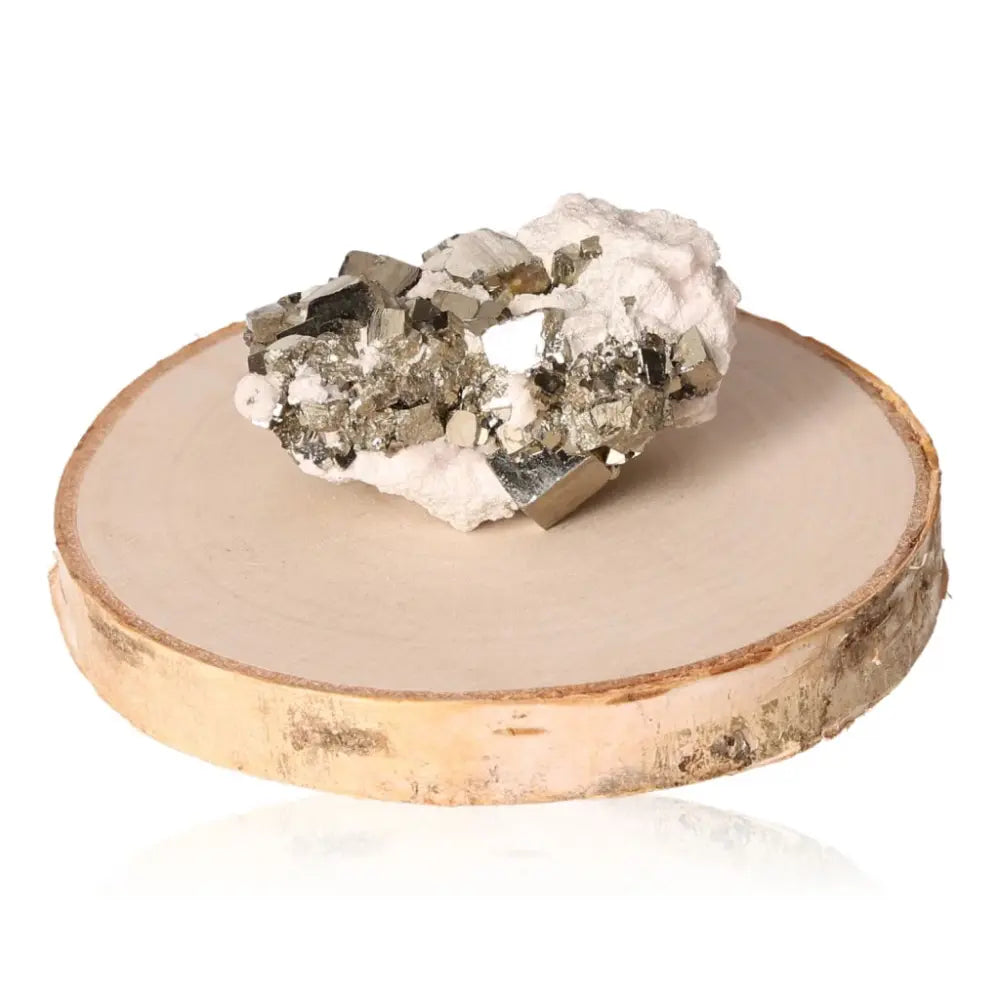Pyrite druze crystal on a wooden display stand, showcasing its vibrant metallic luster and captivating golden hue.