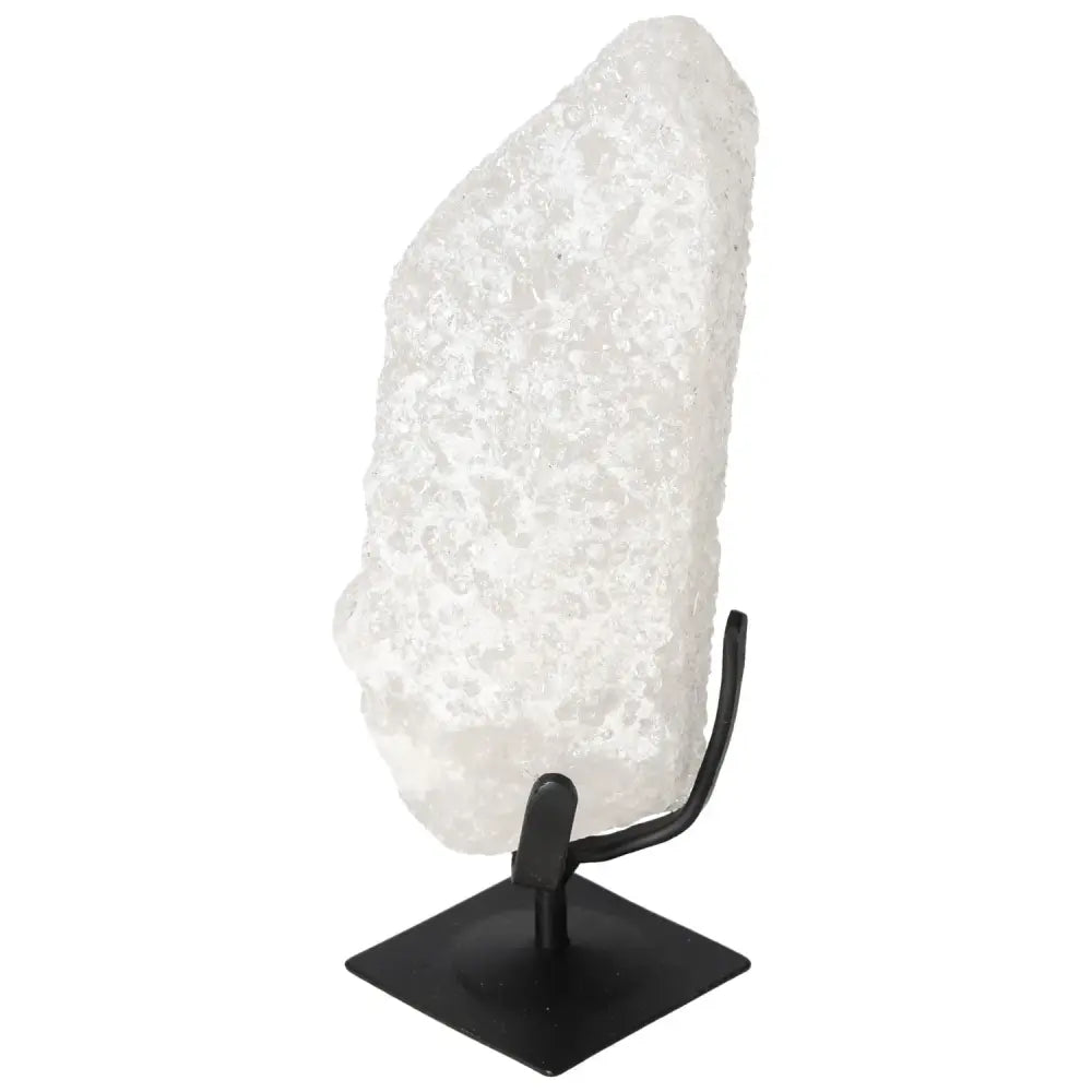 Quartz Crystal Bubble on display stand, showcasing its unique color variations and energetic properties from Sylvia Crystals.