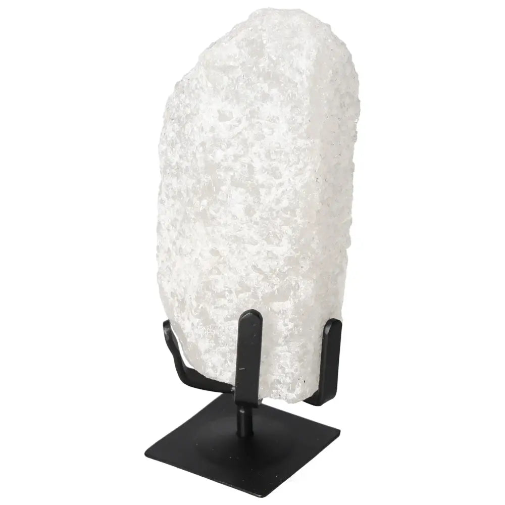 Quartz Crystal Bubble on display stand, highlighting its unique color variations and energetic properties, from Sylvia Crystals.