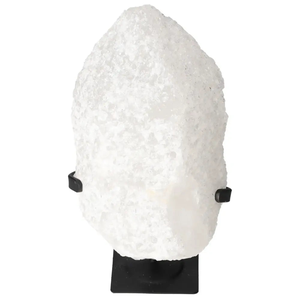 Quartz Crystal Bubble on black stand by Sylvia Crystals, elegant decorative piece for spiritual enhancement.