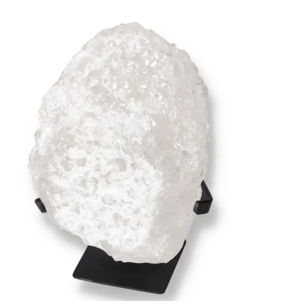 Sylvia Crystals Quartz Crystal Bubble on display; enhances chakra balance and emotional clarity with pure quartz energy.