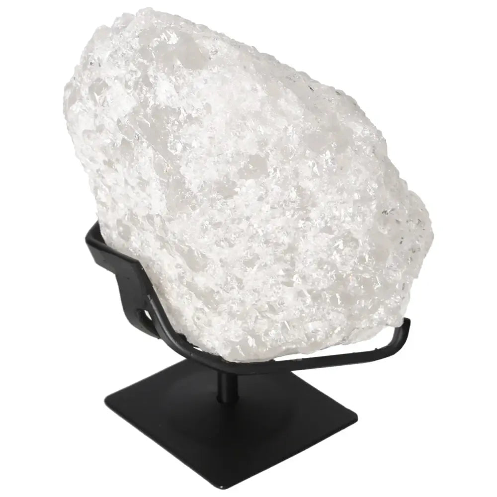 Quartz Crystal Bubble by Sylvia Crystals on stand, offers chakra balance and emotional clarity.