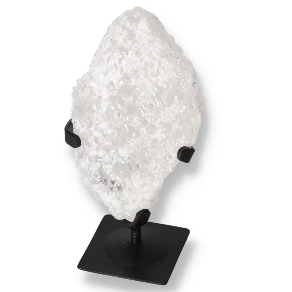 Quartz Crystal Bubble by Sylvia Crystals on a black stand, showcasing its premium quality and modern design.