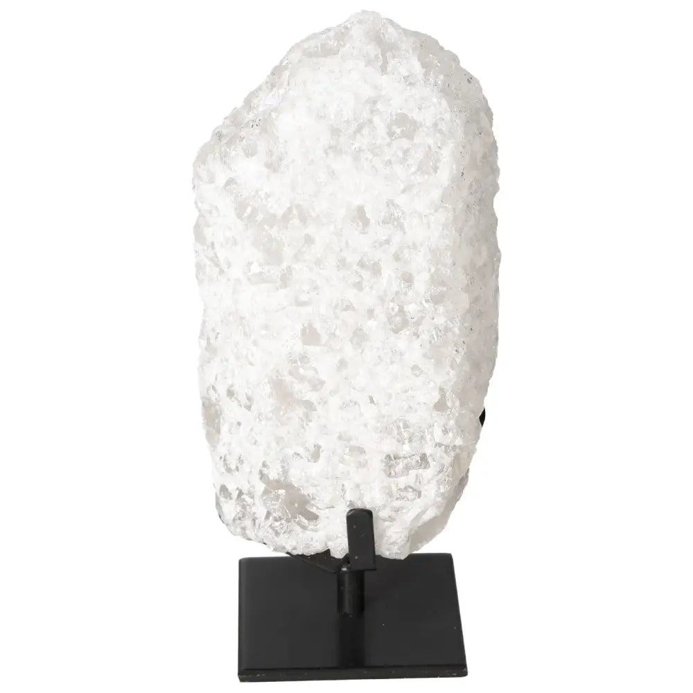 Quartz Crystal Bubble by Sylvia Crystals, showcasing flawless clarity, known for channeling spiritual energy on a stylish black stand.