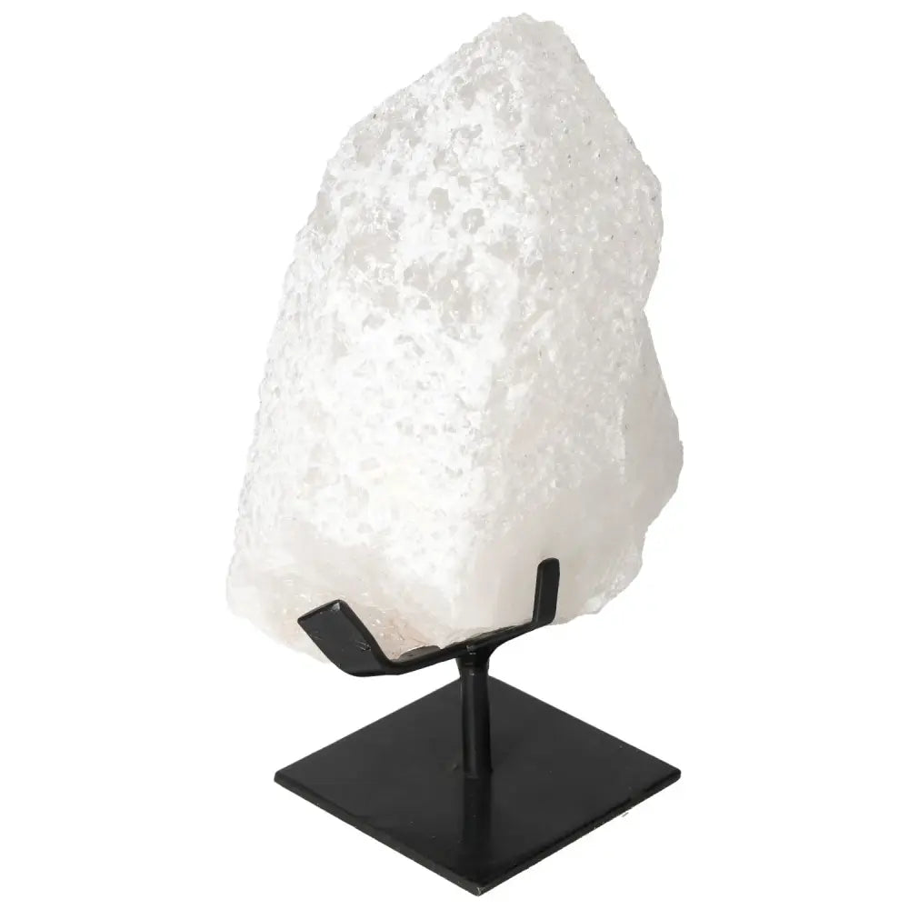 Quartz Crystal Bubble on a black stand, showcasing its multicolored hues, from Sylvia Crystals.