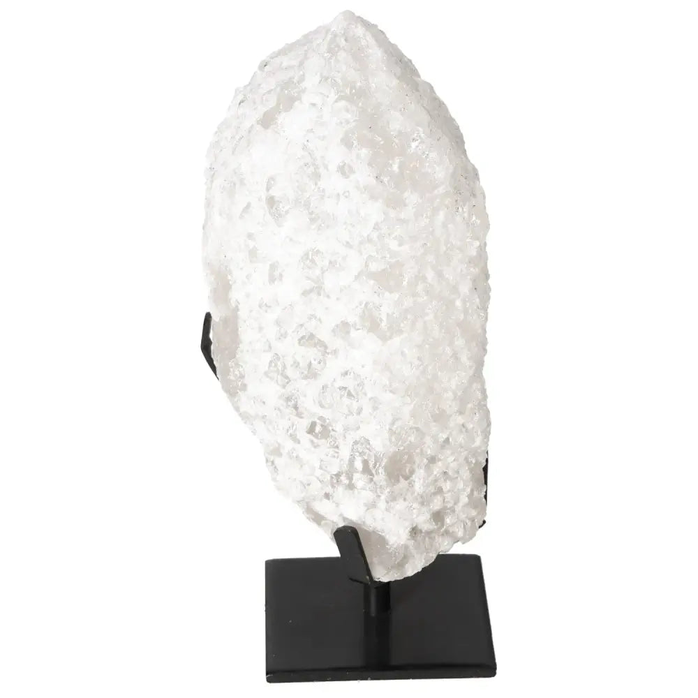 Quartz Crystal Bubble displayed on a black stand, showcasing its artisanal elegance and flawless clarity from Sylvia Crystals.