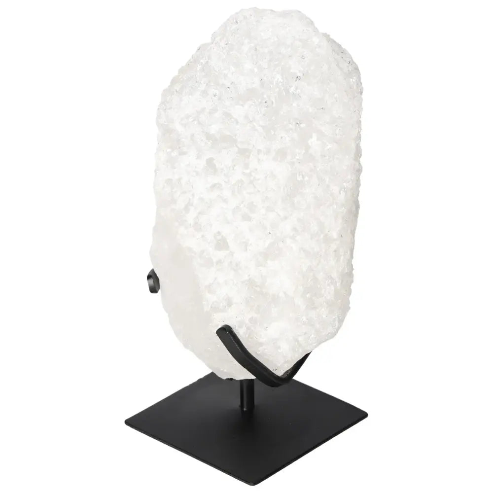 Elegant Quartz Crystal Bubble on a black stand, ideal for decor and spiritual healing, from Sylvia Crystals.
