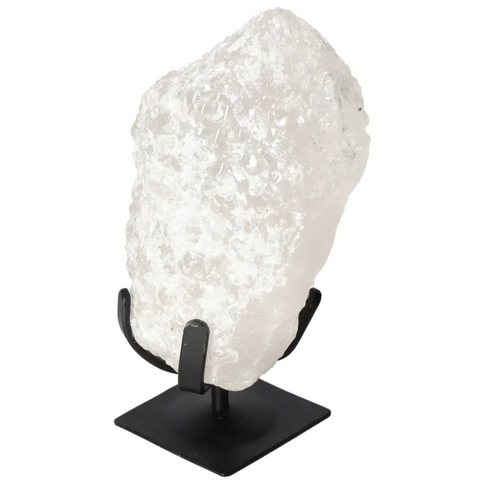 Quartz Crystal Bubble by Sylvia Crystals, displaying its timeless elegance and spiritual benefits on a sleek black stand.