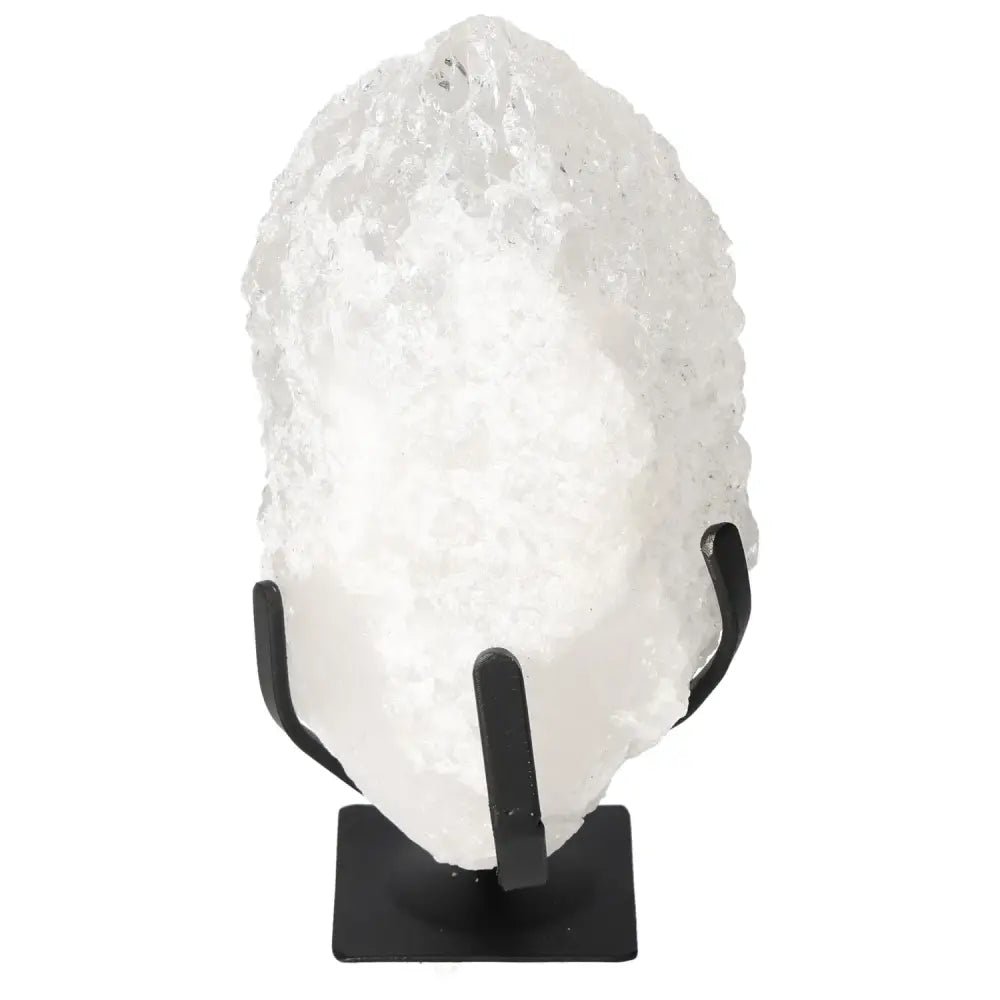 Exquisite Quartz Crystal Bubble from Sylvia Crystals on a stand, showcasing its unique enchanting hue and transformative spiritual properties.