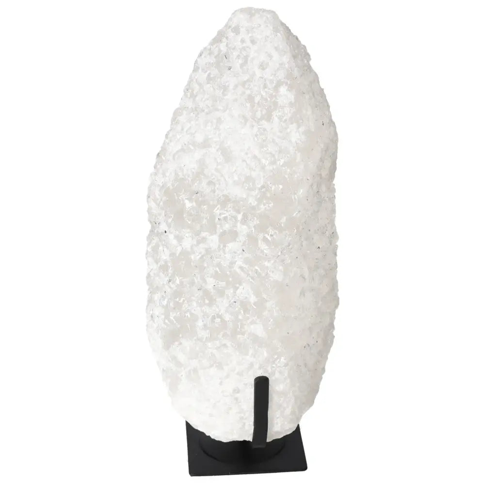 Quartz Crystal Bubble from Sylvia Crystals on a black base, showcasing luxury and spirituality with chakra-aligning hues.