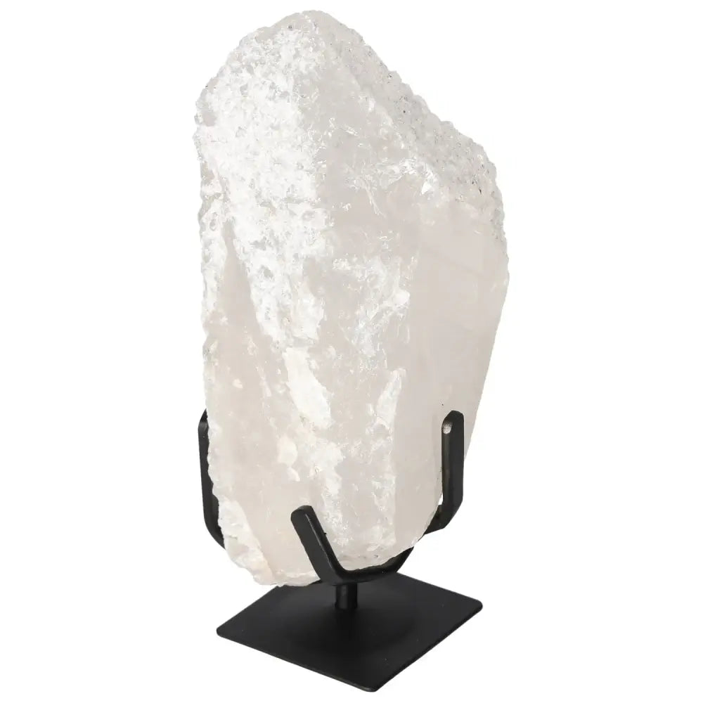 Quartz Crystal Bubble by Sylvia Crystals on stand, enhancing spiritual wellness.