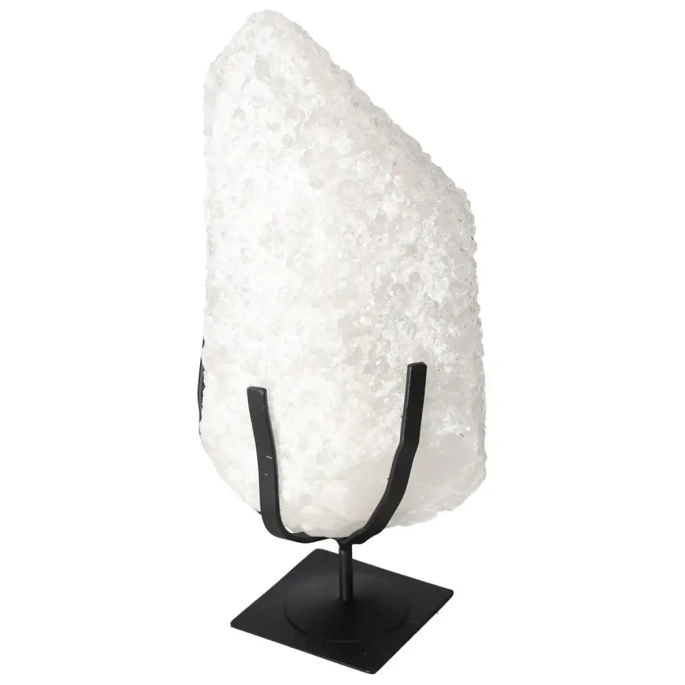 Quartz Crystal Bubble on black stand, showcasing natural texture and spiritual essence for luxury home decor by Sylvia Crystals.