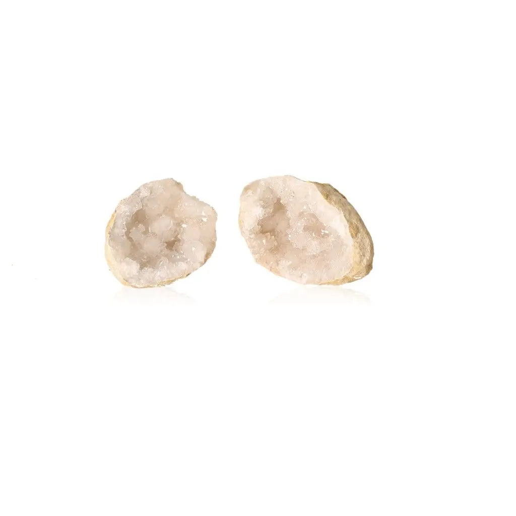 Open Quartz Geode revealing cloudy white crystals, showcasing natural beauty and mystical allure.