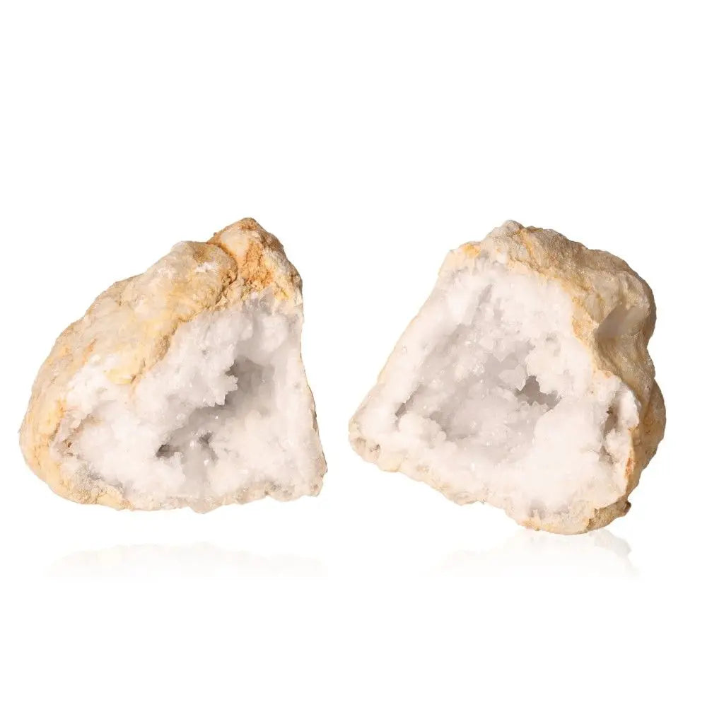 Quartz Geode with sparkling white crystals, open to reveal natural beauty, perfect for enhancing tranquility and clarity in any space.