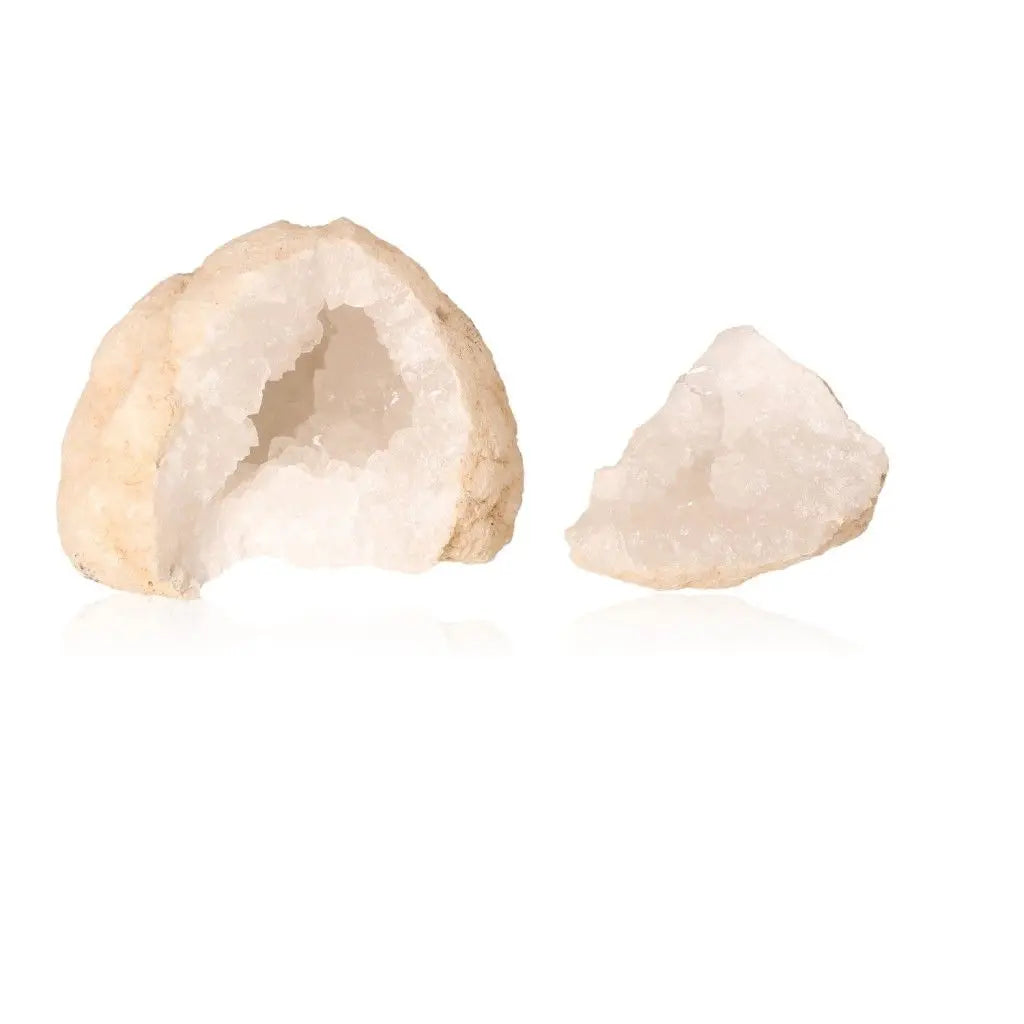 Quartz geode split open revealing sparkling white crystals, showcasing its earthy exterior and vibrant interior, weighing 400-600g.