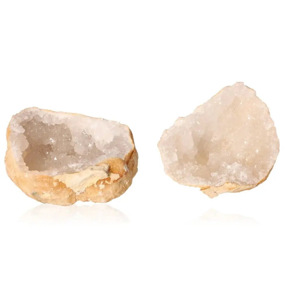 Quartz Geode (400-600g) showcasing milky white crystals against rugged, earthy exterior, perfect for amplifying and purifying energy.