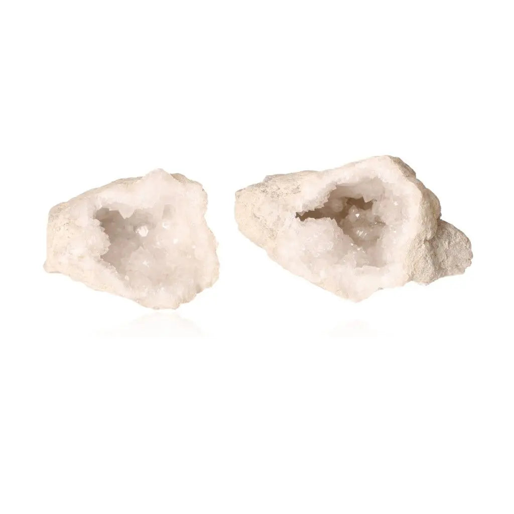 Quartz Geode split open revealing sparkling white crystals, showcasing natural beauty and earthy elegance. Weighs 400-600g.