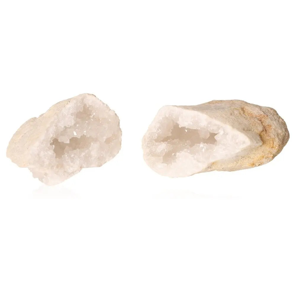 Quartz Geode split open revealing milky quartz crystals, weighing between 400-600g, showcasing natural beauty and mystical charm.