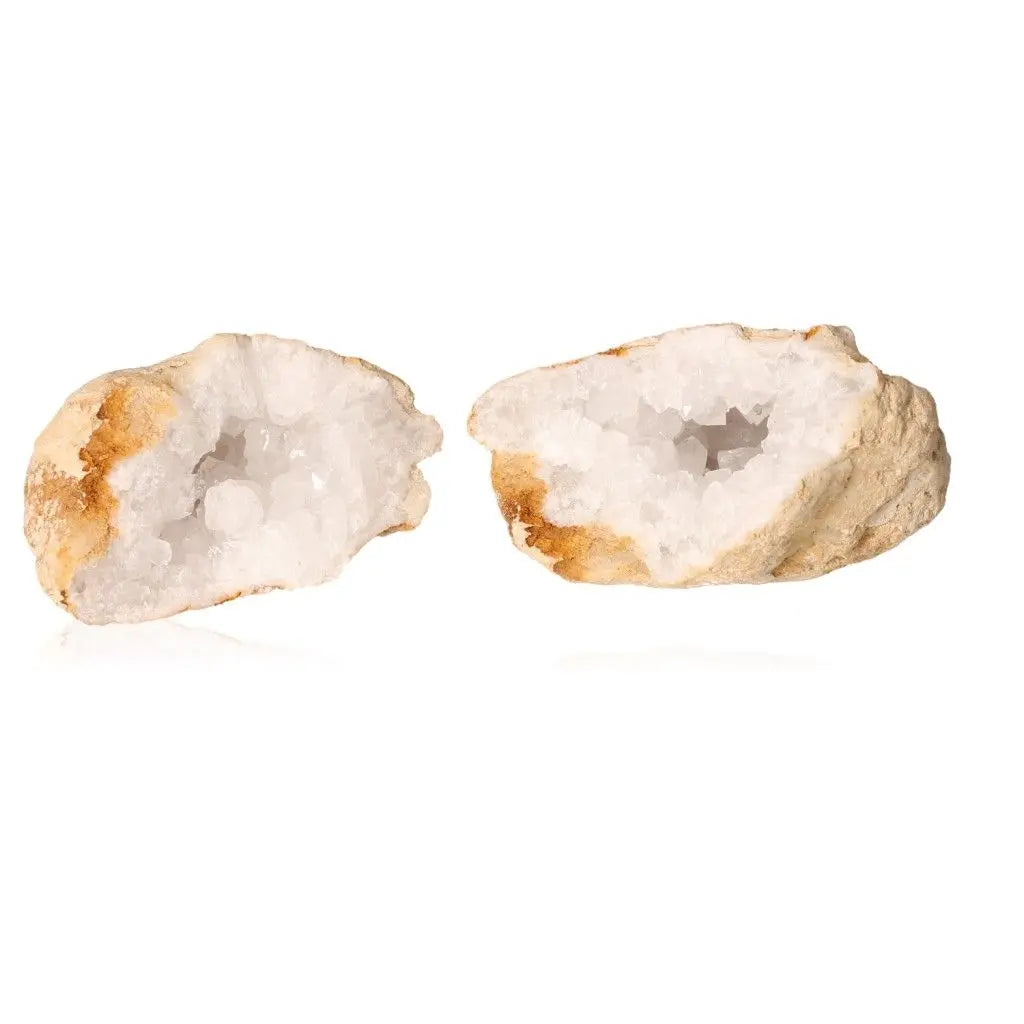 Quartz geode split in half, revealing sparkling white crystals, ideal for decor and energy purification.