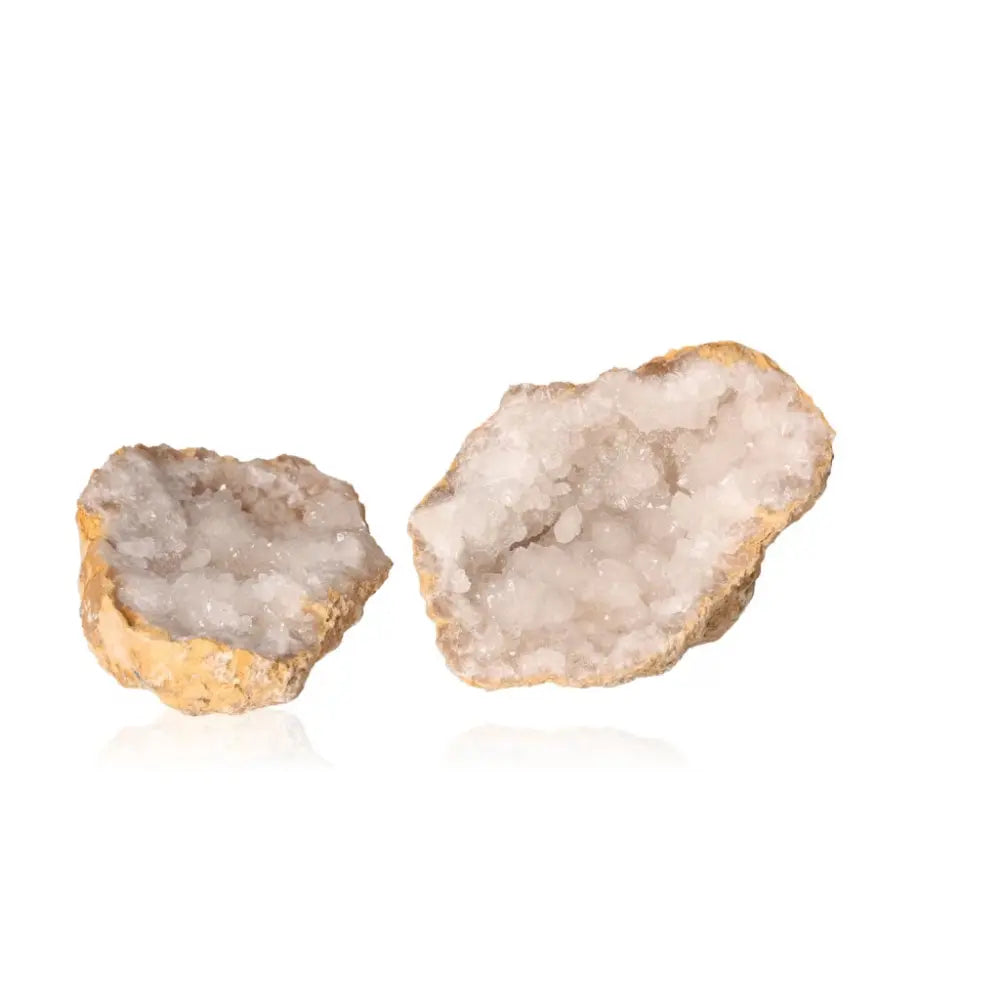 Quartz Geode split open to reveal sparkling crystal interior, weighing 700-900g, showcasing natural elegance and mystical beauty.