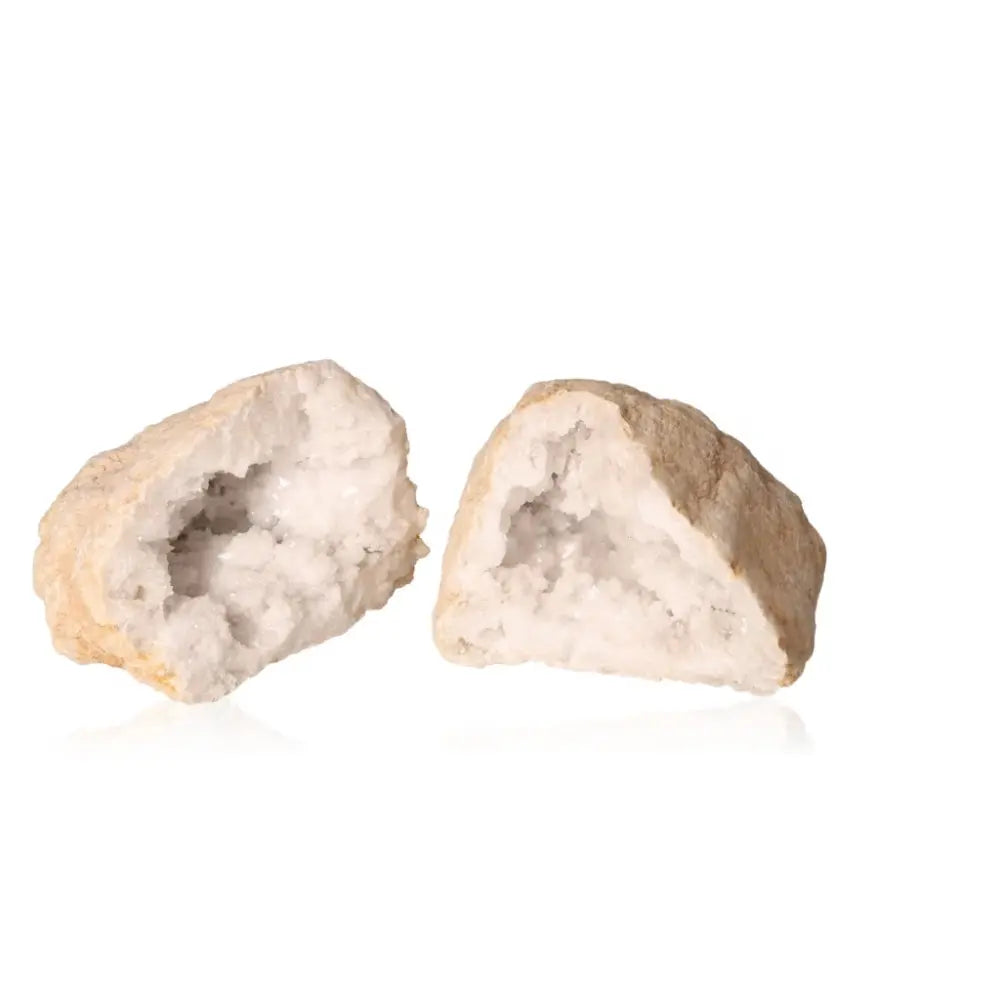 Open quartz geode displaying sparkling white crystals inside rugged earthy exterior (700-900g).