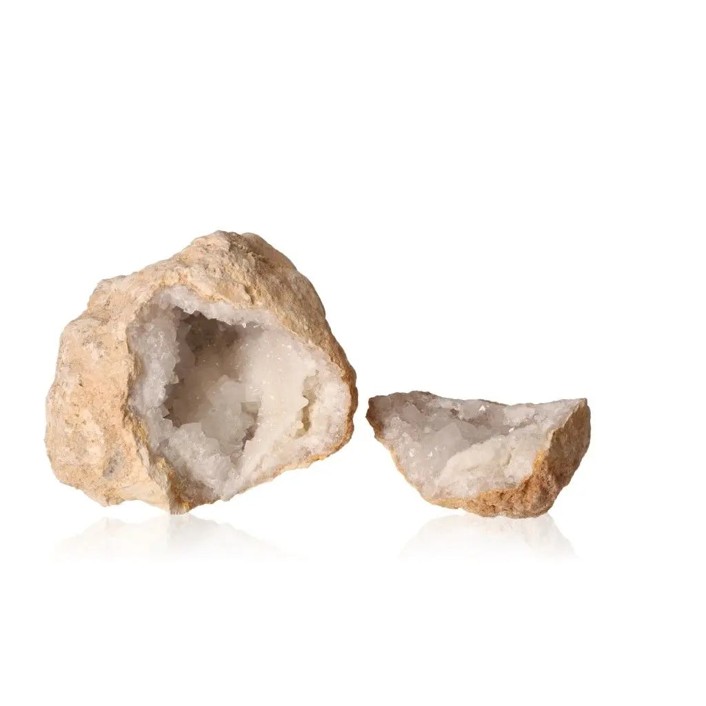 Quartz Geode 700-900g with milky crystals, earthy shell, open to reveal white sparkling interior, promoting peace and serenity.