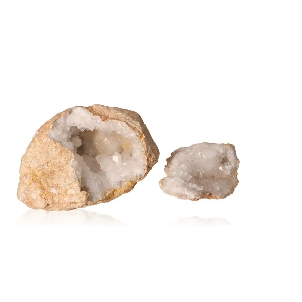 Quartz Geode with milky white crystals, weighing 700-900g, displaying rugged earthy exterior and shimmering interior beauty.