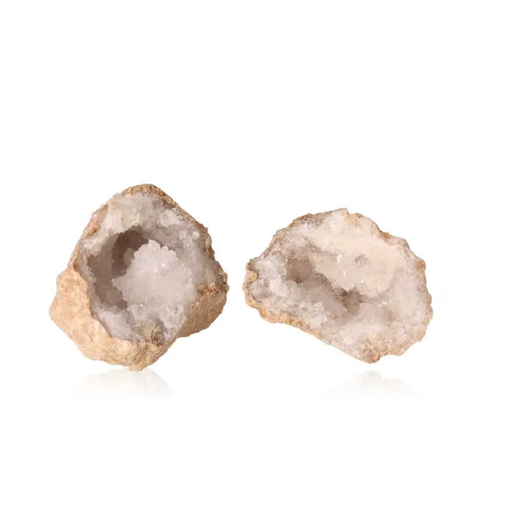 Quartz Geode with rugged exterior and sparkling white crystals, weighing 700-900g, showcasing natural elegance and serenity.