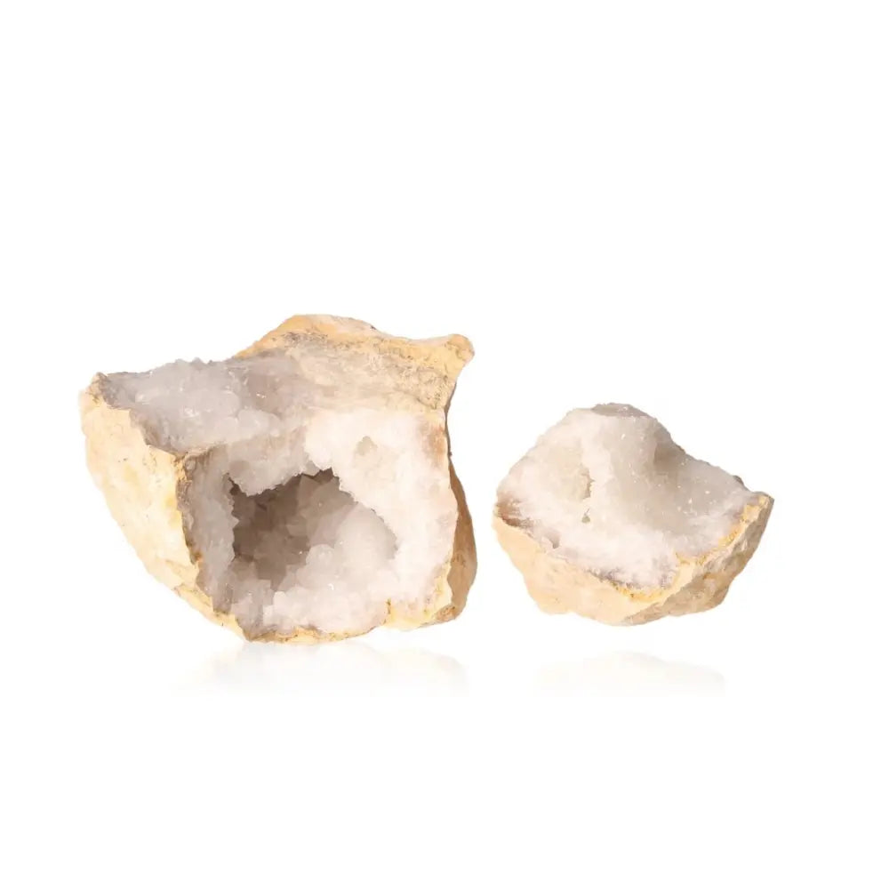 Quartz geode split open, revealing sparkling cloudy white crystals against a rugged outer shell, weighing approximately 700-900g.